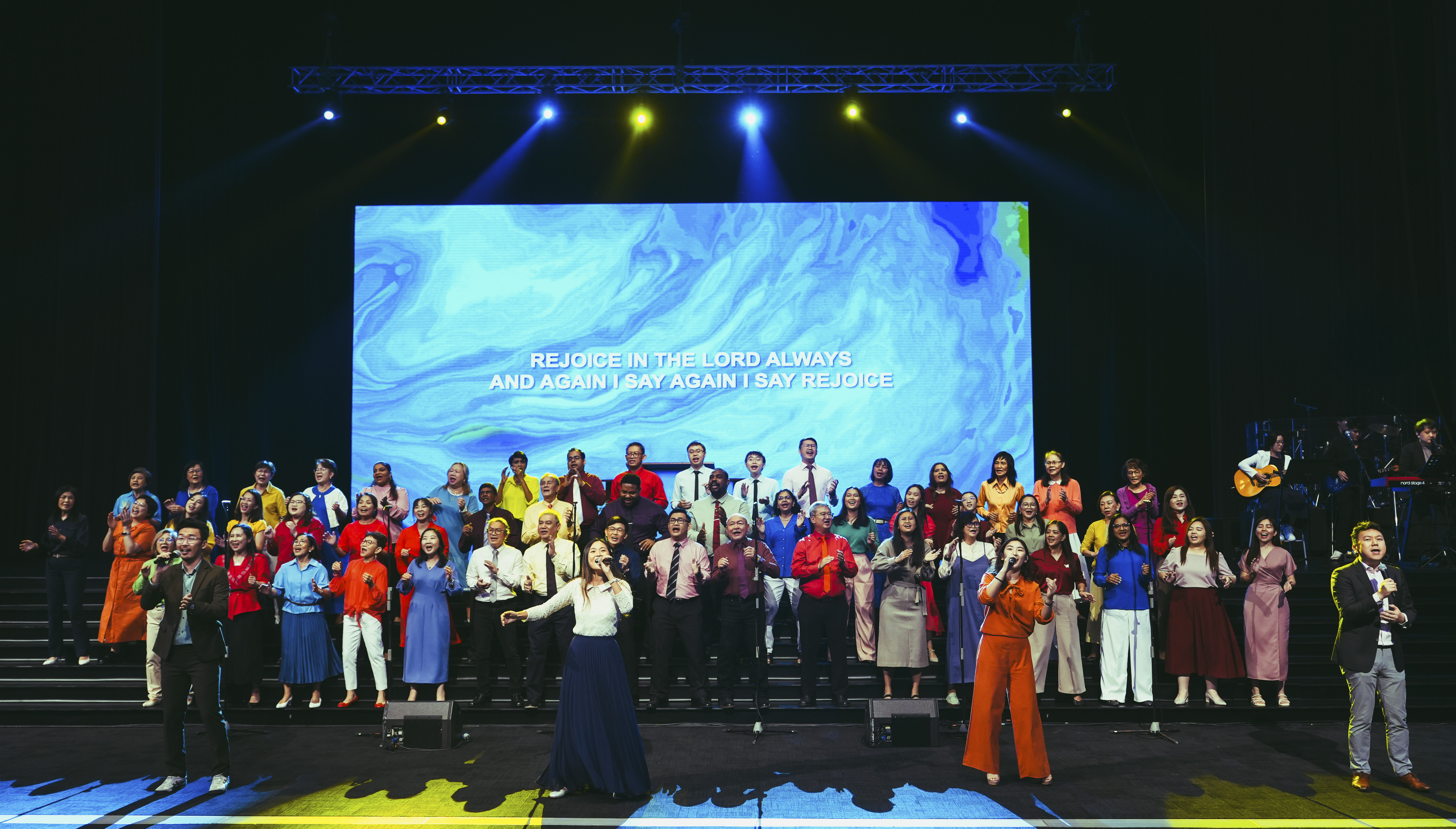  A joyful blend of colour and praise as the choir lifts their voices in worship