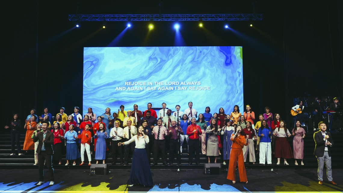  A joyful blend of colour and praise as the choir lifts their voices in worship